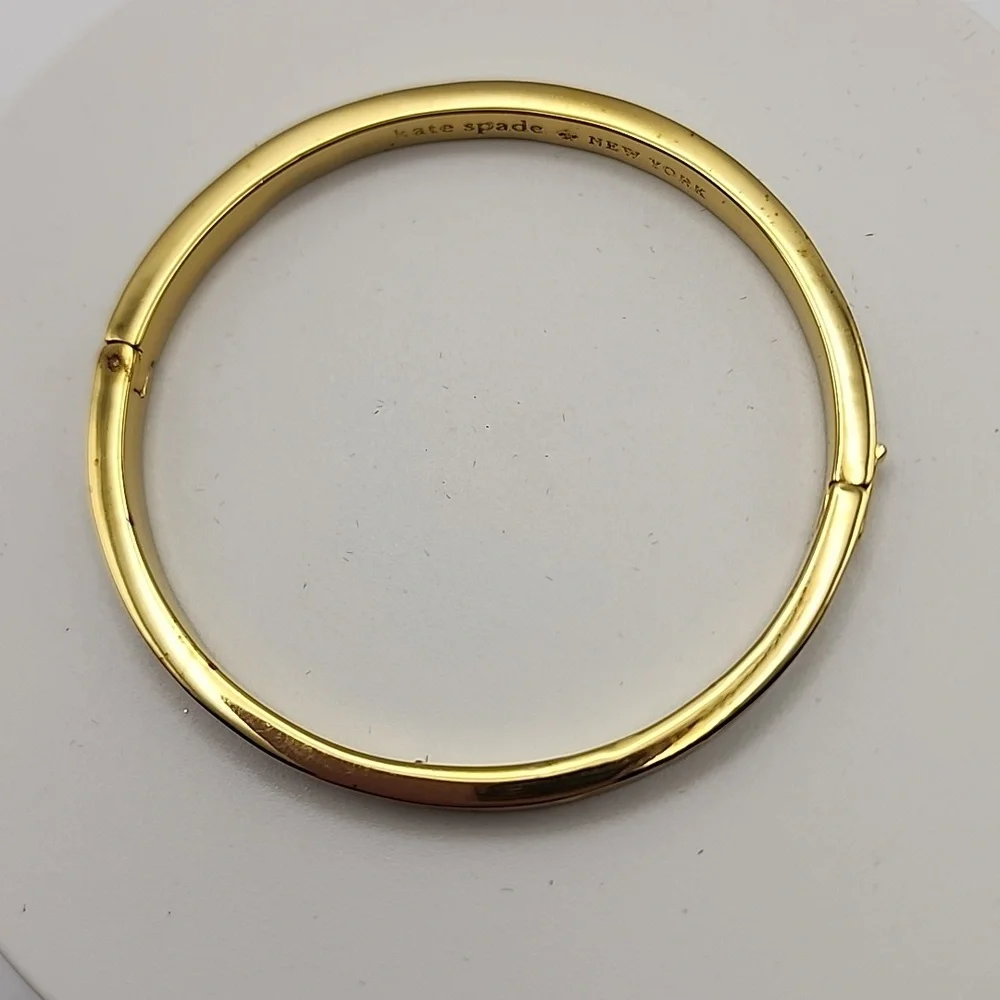 Kate Spade 8‎ Inch Gold Tone and White Bangle Enamel Bracelet